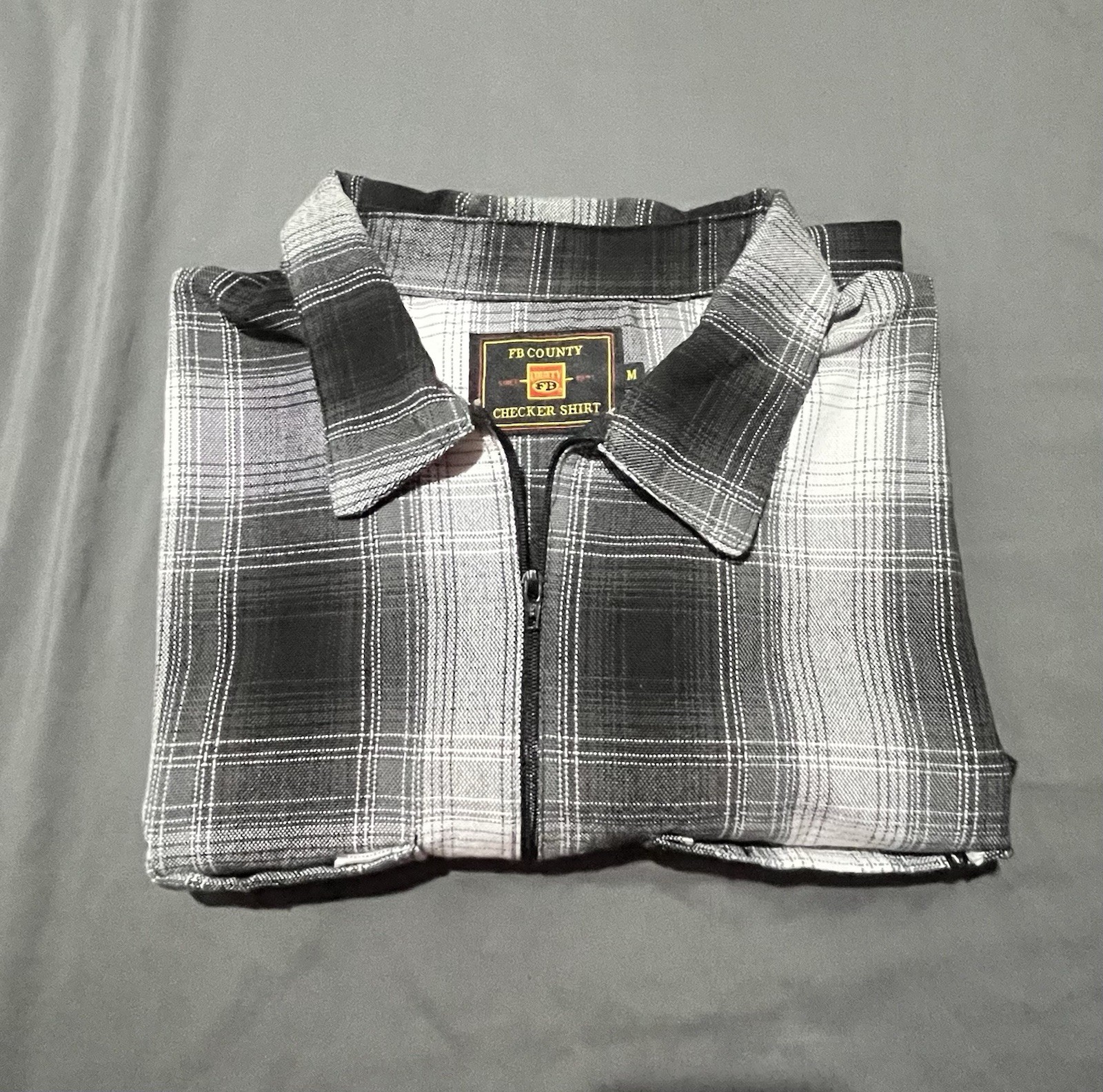 Long Sleeved Black And White Flannel fb County Half Zip